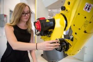 Woman working on machine